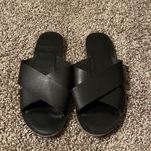 Worn black Sandals